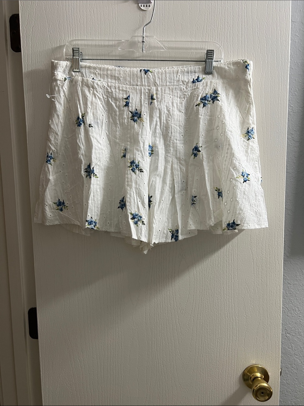 White High-Waist Eyelet Shorts with Blue Floral Print